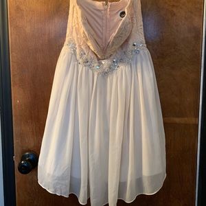 I’m selling a white an blush color dress